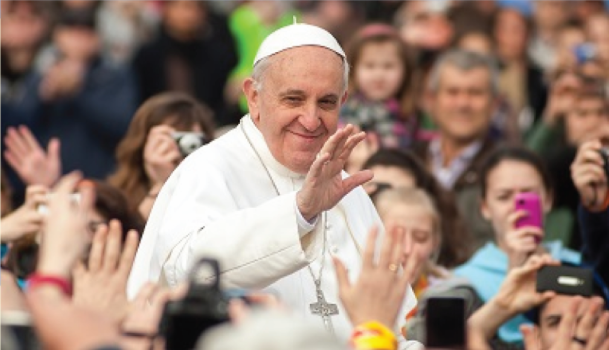Pope Francis smiling and waving